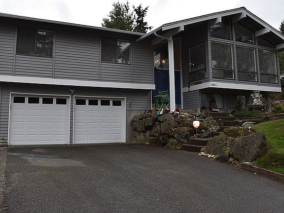 Long, four car driveway 