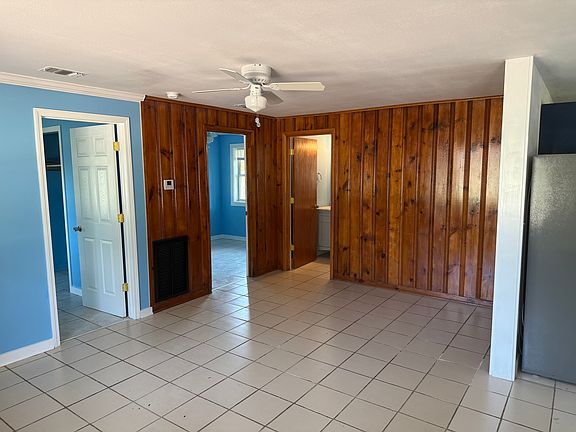 Bed and bath doors view from dining area
