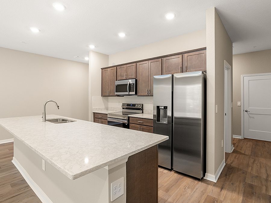 Move-in ready, open layout townhome for sale in St. Cloud, FL, with 3 bedrooms plus a loft!