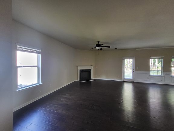 living area with electric fireplace