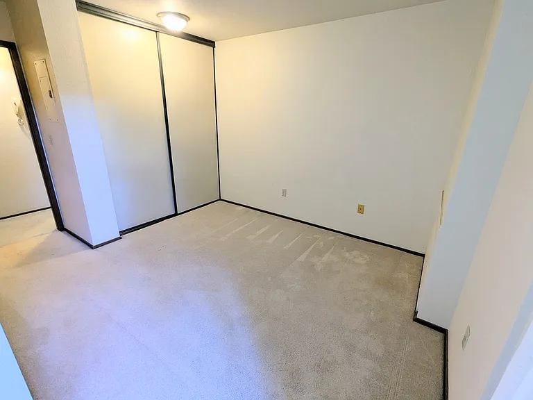 Bedroom easily fits a queen bed