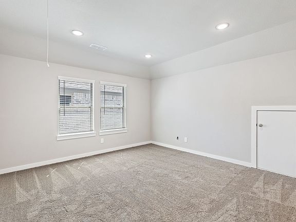 Game room in the Willow home plan by Trophy Signature Homes - REPRESENTATIVE PHOTO