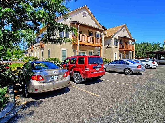 Building 1206, the front side of the unit and grounds, here there is additional unassigned parking