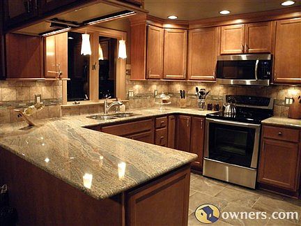 Kitchen is well lit & loaded with features