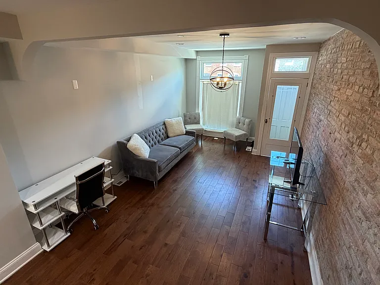 Fully furnished living area and desk for studies