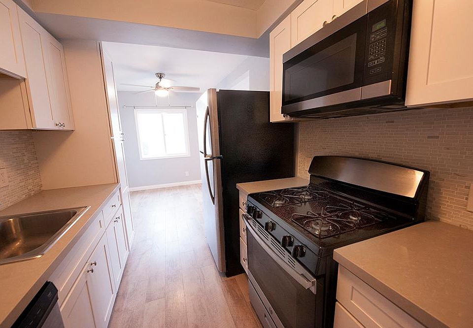 Another view of the kitchen. So easy to use. Great tile backsplash and corian counter tops.
