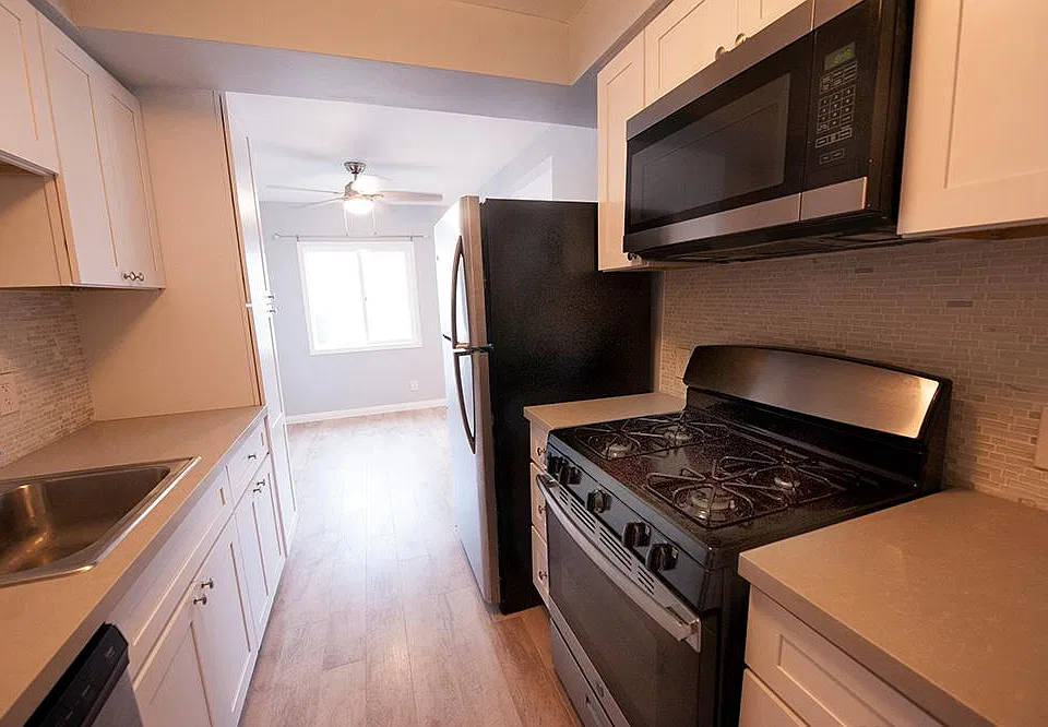 Another view of the kitchen. So easy to use. Great tile backsplash and corian counter tops.
