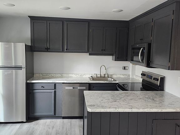 Kitchen - new stove, new microwave, new dishwasher, and a new full-size refrigerator.