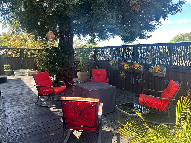 The deck is about 1,000 square feet of outdoor living space. It would be a perfect spot for a jacuzzi or for entertaining in the spring and summer.