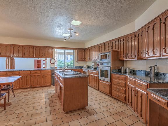 5th image of 13120 Della Longa Ln NE