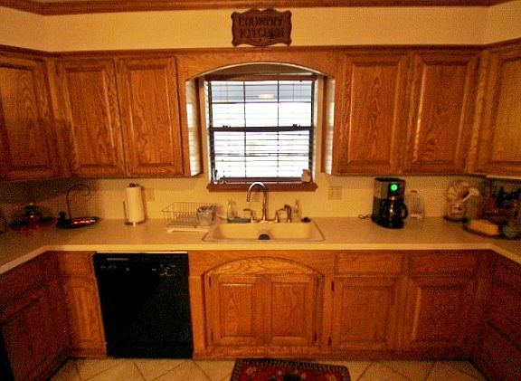 Kitchen has a dishwasher.