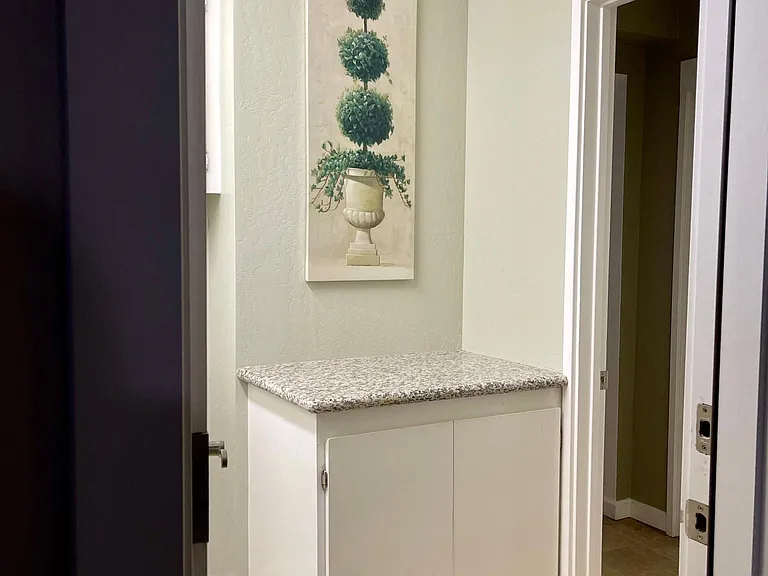 Entry into the laundry room from the garage door
