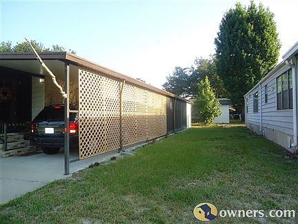 Carport and right yard