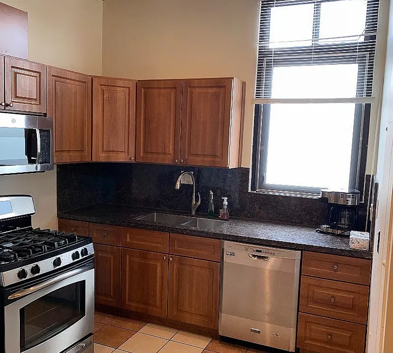 Separate kitchen, washer dryer and bathroom with shower.