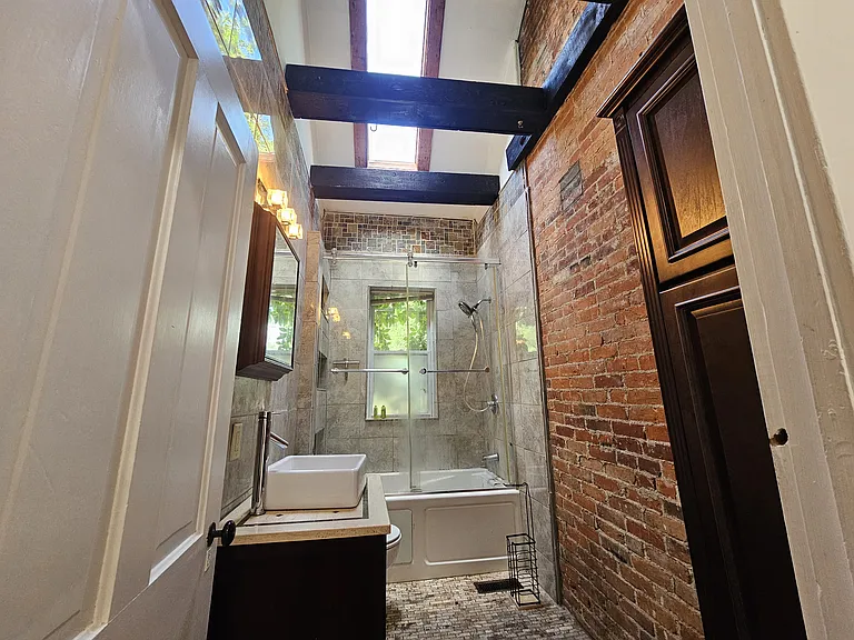 Rustic meets modern a one-of-a-kind bathroom.