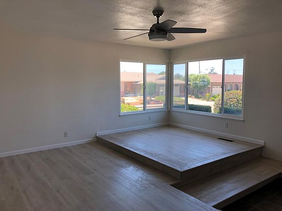 living room with electric fan