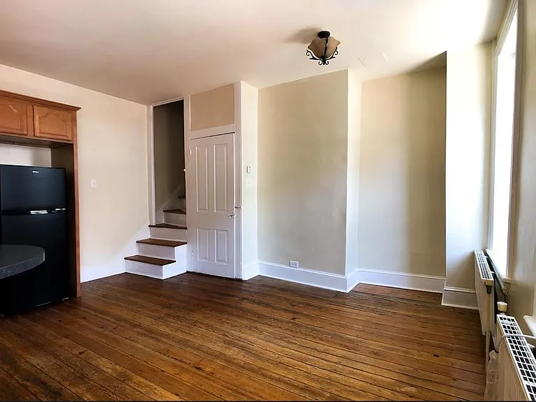 The living room has been refreshed with refinished hardwood floors and recessed lighting - updated listing photos coming soon!