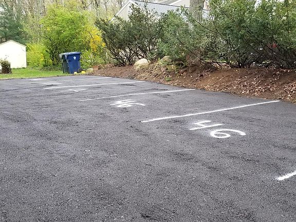 Paved parking - 3 assigned spaces for this home!
