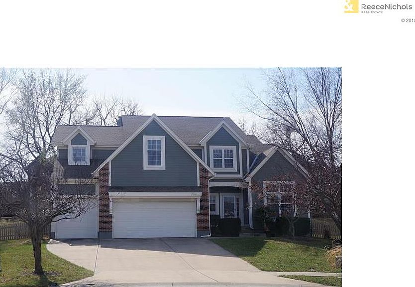 Front of home on cul-de-sac lot with 3 car garage