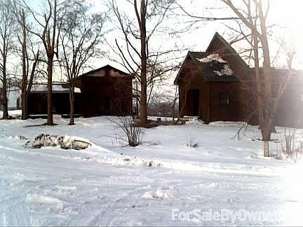 The Two Rustic Cottages in Winter : The Old Bethlehem School Cottages are connected by concrete side