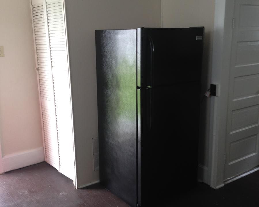 Behind Bi-fold door is the water heater. Bathroom door on th