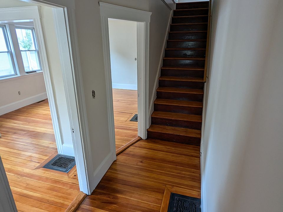 Entry Way. Living, Dining, and Kitchen to the left. Up the stairs is 3 good sized bedrooms and bathroom