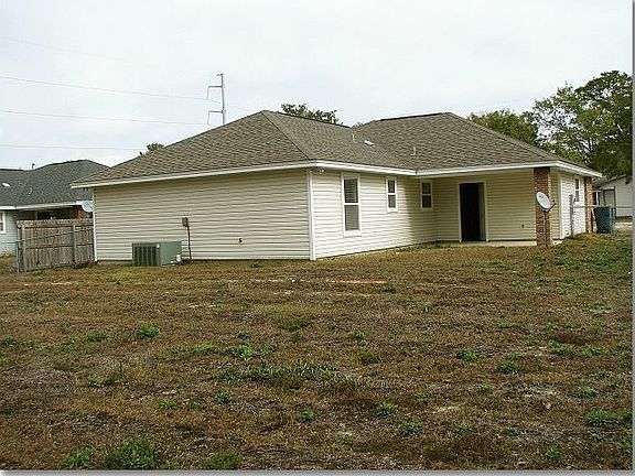 Large back yard. Room for a pool!