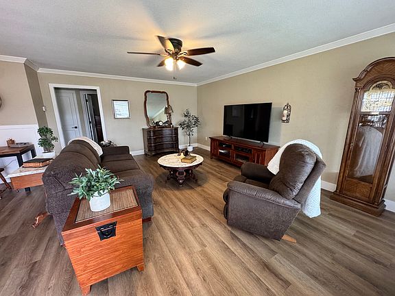 Large open living room with lots of natural light