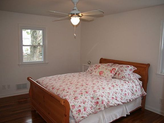 one of three bedrooms
