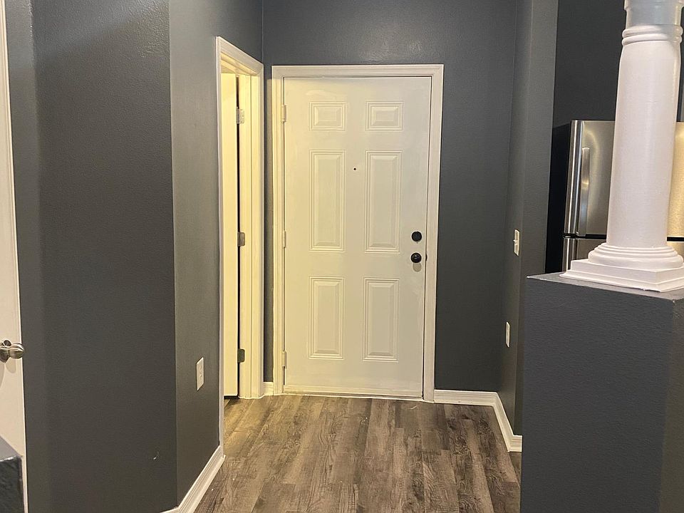 Entry & Front Door - Half Bath To The Left