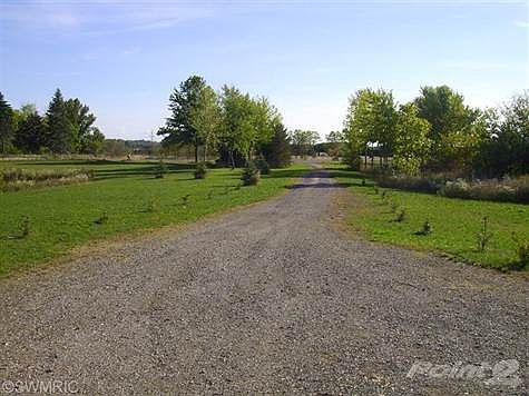 Looking toward the street, the pond is on the left.