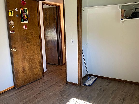inside right corner view of closet,door, and door of Room 2.