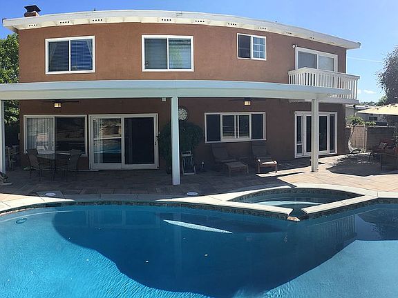 Patio cover with ceiling fan