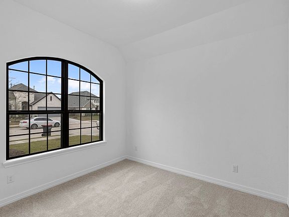 Bedroom two s oversized arched windows make for a statement for a stunning guest room or playful chi