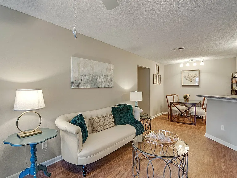 Spacious living room with hardwood-style flooring