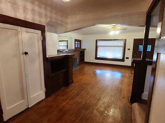 Large bright open family room with high ceilings and large windows