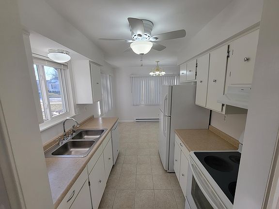 Kitchen looking from laundry room toward dining area
