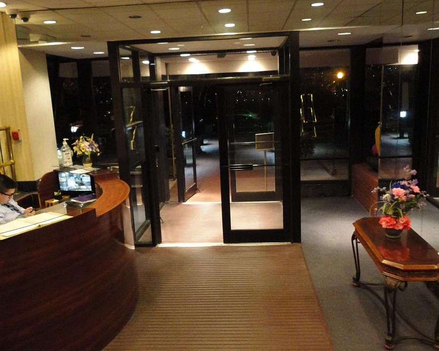 Front door to lobby with doorman