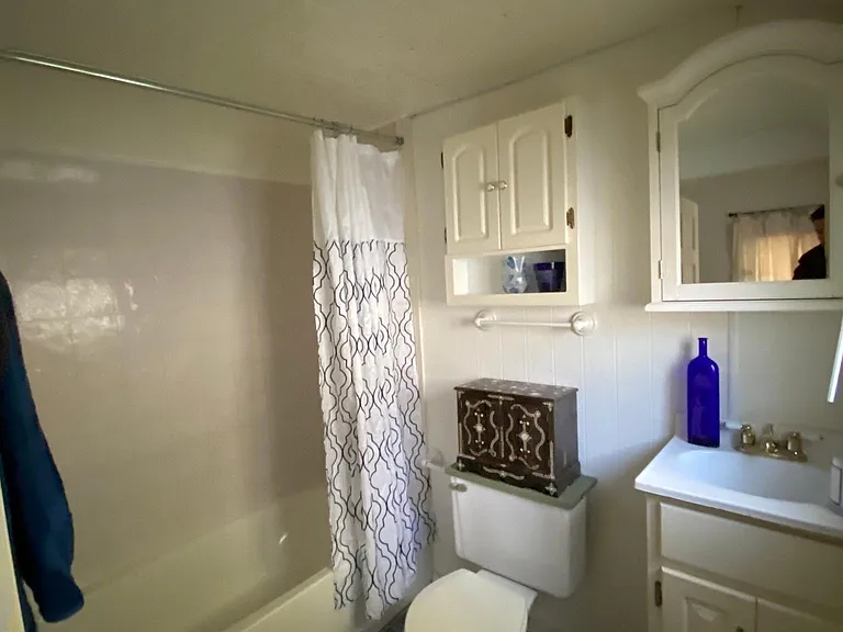 The first bedroom's attached bathroom