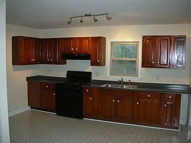 Beautiful kitchen with new stove, countertops, and updated l