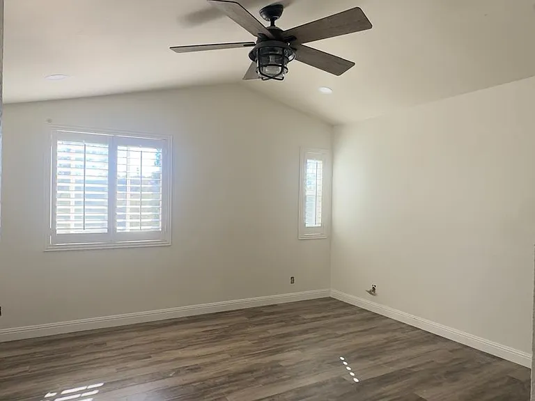 Grand Primary Bedroom with Abundant Natural Light