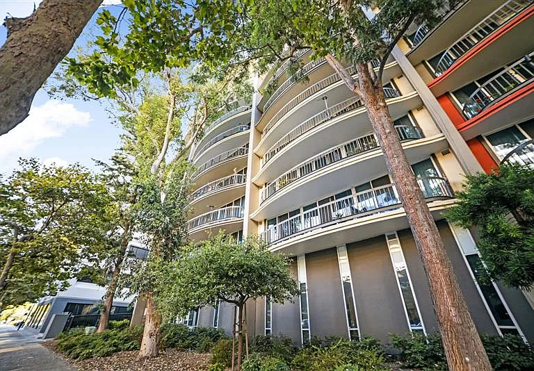 Surrounded by lush greenery, Town Park Towers offers serene living in the heart of the city.