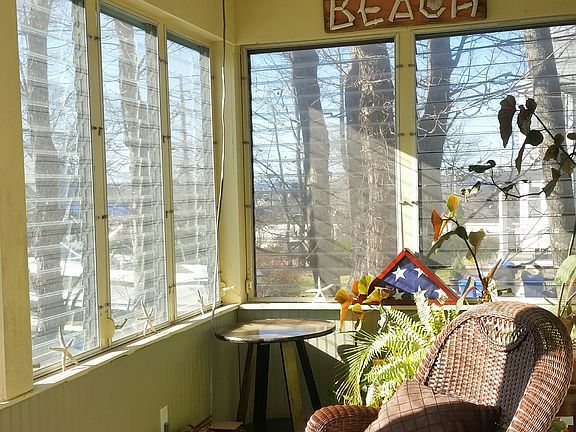 Front porch is delightful and beachy and solar heated
