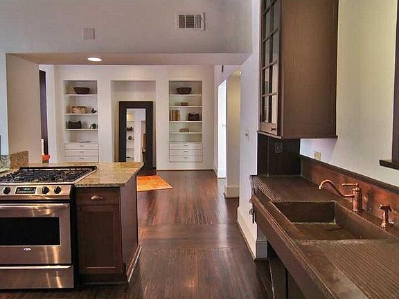 Original hand-hammered copper sink and counter