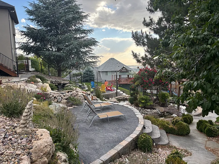 Backyard oasis with newly finished dual landings (fire pit on far landing)