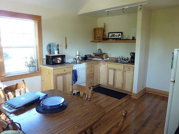 Kitchen/dining shown furnished.