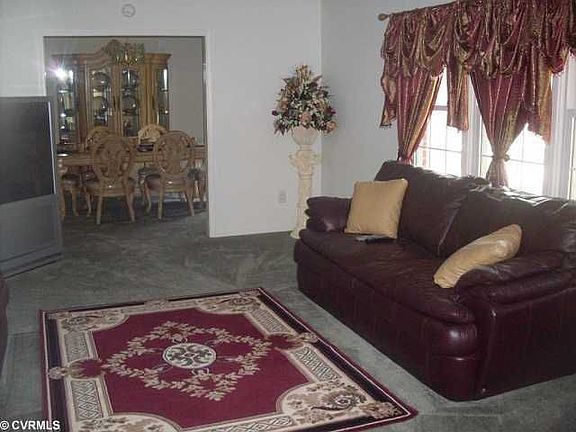 living room overlooking into the dining room