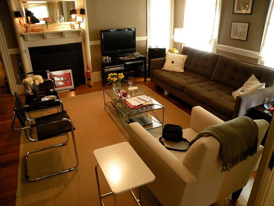 Living/Dining shown furnished. Non-working fireplace.