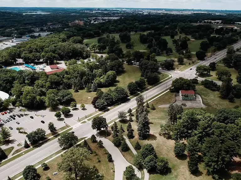Overview of HIghland park including the community pool and golf course.