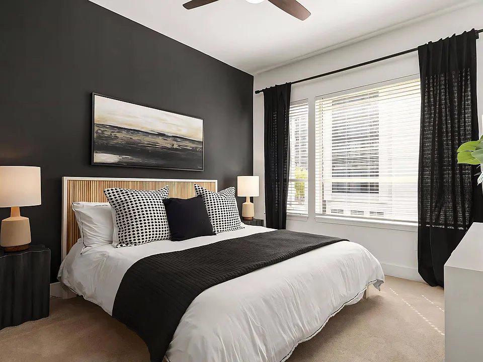 Modern Bedroom Featuring Statement Wallpaper and Generous Windows